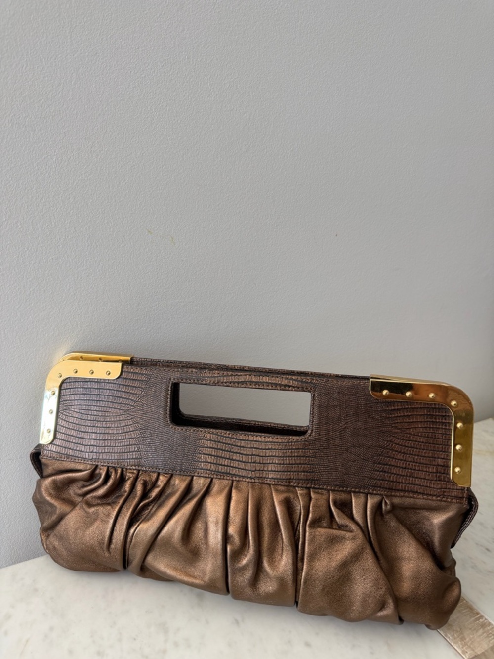 BCBGMaxAzria Bronze Metallic Pleated Clutch with Cutout Handle